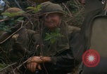 Image of Injured soldier evacuated Vietnam War Vietnam, 1968, second 11 stock footage video 65675080523
