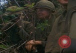 Image of Injured soldier evacuated Vietnam War Vietnam, 1968, second 15 stock footage video 65675080523
