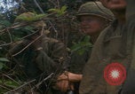Image of Injured soldier evacuated Vietnam War Vietnam, 1968, second 16 stock footage video 65675080523
