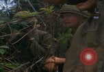 Image of Injured soldier evacuated Vietnam War Vietnam, 1968, second 17 stock footage video 65675080523