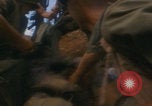 Image of Injured soldier evacuated Vietnam War Vietnam, 1968, second 52 stock footage video 65675080523