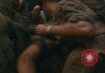 Image of Injured soldier evacuated Vietnam War Vietnam, 1968, second 55 stock footage video 65675080523