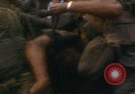 Image of Injured soldier evacuated Vietnam War Vietnam, 1968, second 56 stock footage video 65675080523