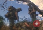 Image of soldiers in jungle Vietnam War Vietnam, 1968, second 3 stock footage video 65675080524