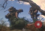 Image of soldiers in jungle Vietnam War Vietnam, 1968, second 4 stock footage video 65675080524