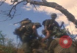 Image of soldiers in jungle Vietnam War Vietnam, 1968, second 9 stock footage video 65675080524