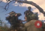 Image of soldiers in jungle Vietnam War Vietnam, 1968, second 10 stock footage video 65675080524