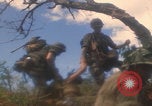 Image of soldiers in jungle Vietnam War Vietnam, 1968, second 11 stock footage video 65675080524
