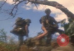 Image of soldiers in jungle Vietnam War Vietnam, 1968, second 12 stock footage video 65675080524