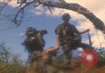 Image of soldiers in jungle Vietnam War Vietnam, 1968, second 13 stock footage video 65675080524