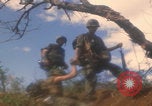 Image of soldiers in jungle Vietnam War Vietnam, 1968, second 14 stock footage video 65675080524