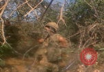 Image of soldiers in jungle Vietnam War Vietnam, 1968, second 17 stock footage video 65675080524