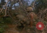 Image of soldiers in jungle Vietnam War Vietnam, 1968, second 26 stock footage video 65675080524