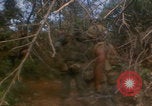 Image of soldiers in jungle Vietnam War Vietnam, 1968, second 27 stock footage video 65675080524