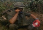 Image of soldiers in jungle Vietnam War Vietnam, 1968, second 28 stock footage video 65675080524