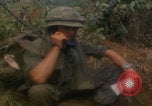 Image of soldiers in jungle Vietnam War Vietnam, 1968, second 29 stock footage video 65675080524