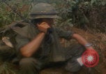 Image of soldiers in jungle Vietnam War Vietnam, 1968, second 30 stock footage video 65675080524