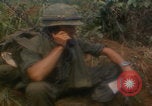 Image of soldiers in jungle Vietnam War Vietnam, 1968, second 31 stock footage video 65675080524