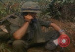 Image of soldiers in jungle Vietnam War Vietnam, 1968, second 32 stock footage video 65675080524