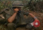 Image of soldiers in jungle Vietnam War Vietnam, 1968, second 33 stock footage video 65675080524