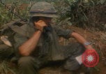 Image of soldiers in jungle Vietnam War Vietnam, 1968, second 34 stock footage video 65675080524