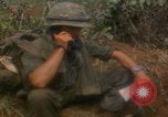 Image of soldiers in jungle Vietnam War Vietnam, 1968, second 35 stock footage video 65675080524