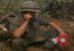 Image of soldiers in jungle Vietnam War Vietnam, 1968, second 36 stock footage video 65675080524