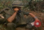 Image of soldiers in jungle Vietnam War Vietnam, 1968, second 37 stock footage video 65675080524