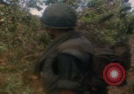 Image of soldiers in jungle Vietnam War Vietnam, 1968, second 39 stock footage video 65675080524