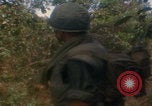 Image of soldiers in jungle Vietnam War Vietnam, 1968, second 43 stock footage video 65675080524