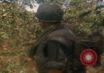 Image of soldiers in jungle Vietnam War Vietnam, 1968, second 47 stock footage video 65675080524