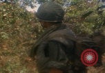 Image of soldiers in jungle Vietnam War Vietnam, 1968, second 48 stock footage video 65675080524