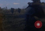 Image of US soldiers running Vietnam, 1968, second 8 stock footage video 65675080525