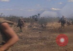 Image of US soldiers running Vietnam, 1968, second 10 stock footage video 65675080525