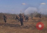Image of US soldiers running Vietnam, 1968, second 15 stock footage video 65675080525