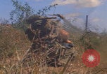 Image of US soldiers running Vietnam, 1968, second 22 stock footage video 65675080525