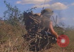 Image of US soldiers running Vietnam, 1968, second 24 stock footage video 65675080525