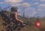 Image of US soldiers running Vietnam, 1968, second 28 stock footage video 65675080525