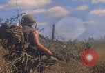 Image of US soldiers running Vietnam, 1968, second 29 stock footage video 65675080525