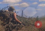 Image of US soldiers running Vietnam, 1968, second 30 stock footage video 65675080525