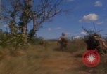 Image of US soldiers running Vietnam, 1968, second 35 stock footage video 65675080525