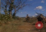 Image of US soldiers running Vietnam, 1968, second 36 stock footage video 65675080525