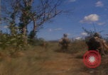 Image of US soldiers running Vietnam, 1968, second 37 stock footage video 65675080525