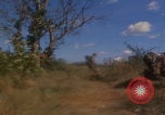 Image of US soldiers running Vietnam, 1968, second 42 stock footage video 65675080525