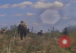 Image of US soldiers running Vietnam, 1968, second 51 stock footage video 65675080525