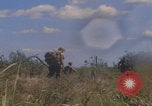 Image of US soldiers running Vietnam, 1968, second 53 stock footage video 65675080525