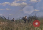 Image of US soldiers running Vietnam, 1968, second 55 stock footage video 65675080525