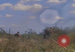Image of US soldiers running Vietnam, 1968, second 56 stock footage video 65675080525
