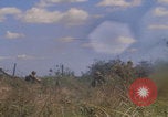 Image of US soldiers running Vietnam, 1968, second 57 stock footage video 65675080525