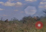 Image of US soldiers running Vietnam, 1968, second 58 stock footage video 65675080525